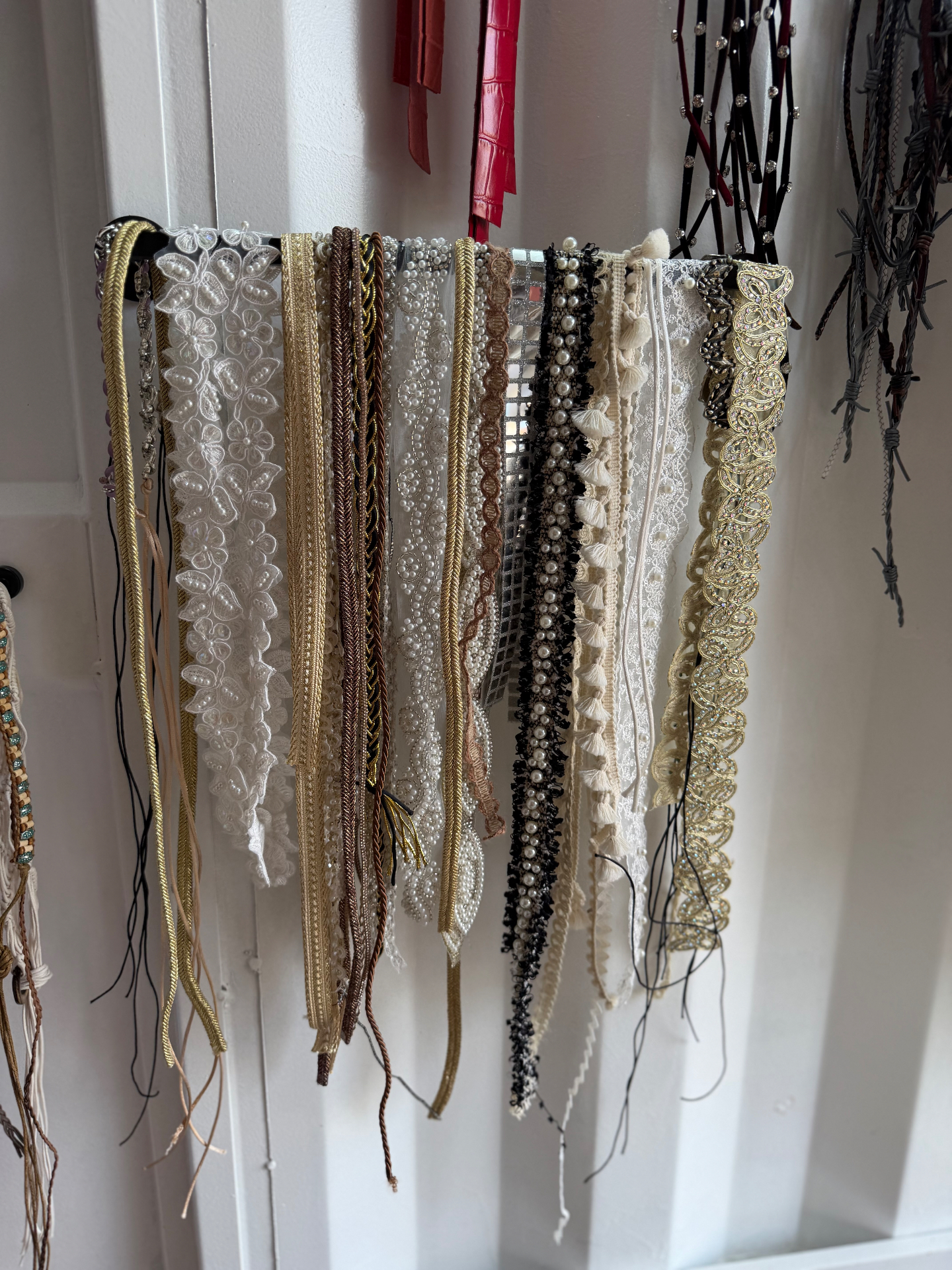 Assorted trims — pearl, gold, lace, mirror, black beaded