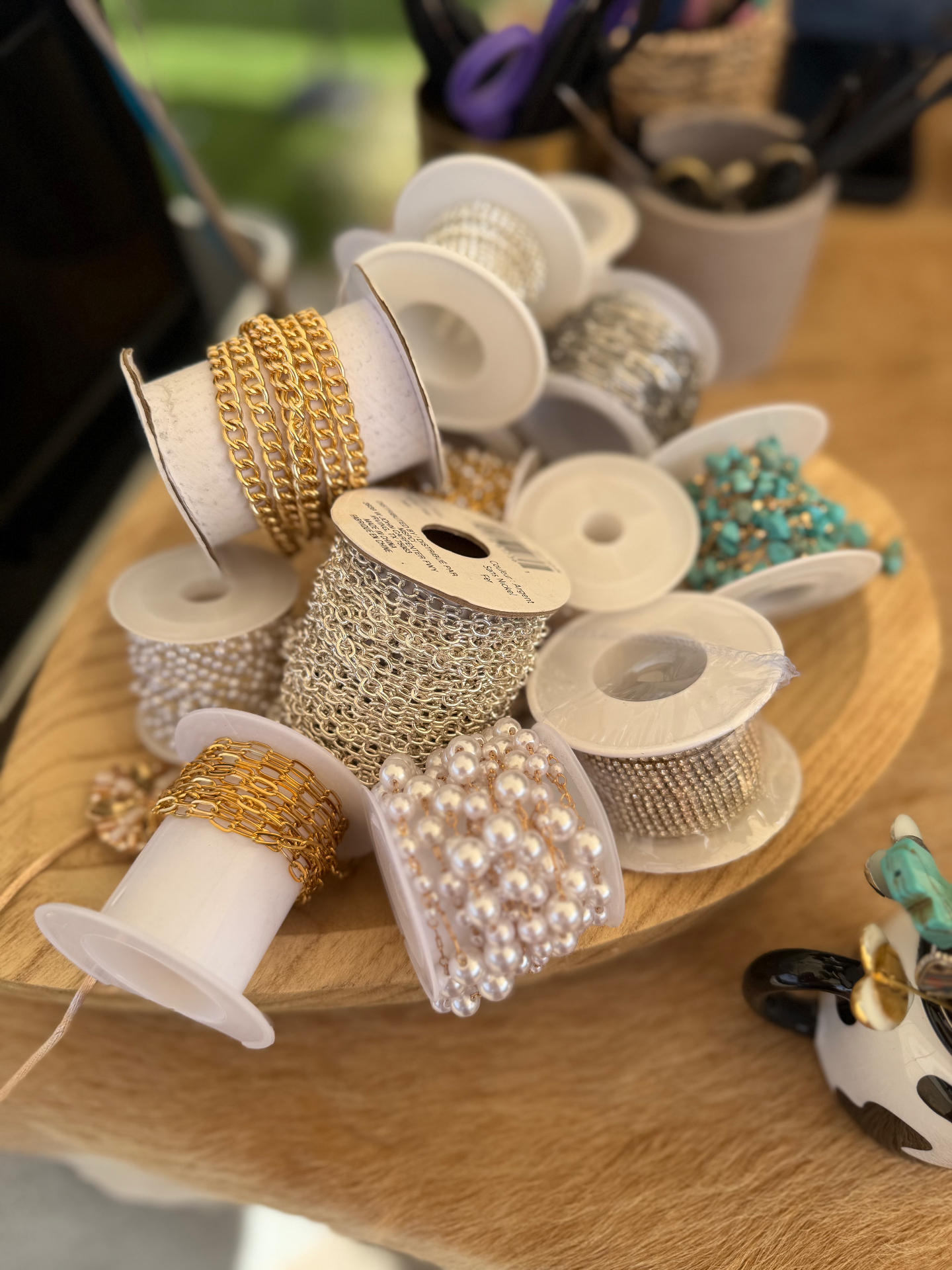 Spools of chain and pearl trim