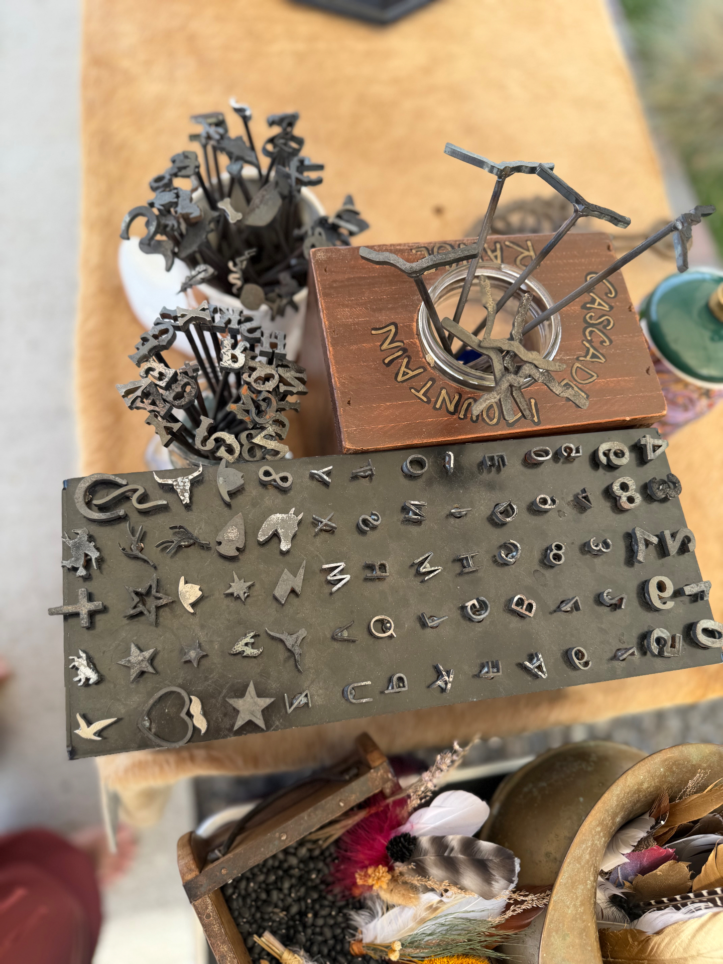 Collection of branding stamps and charms